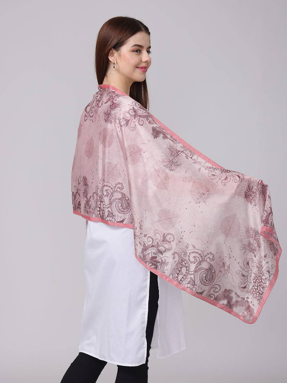 Side view of crepe pink floral printed scarf on model