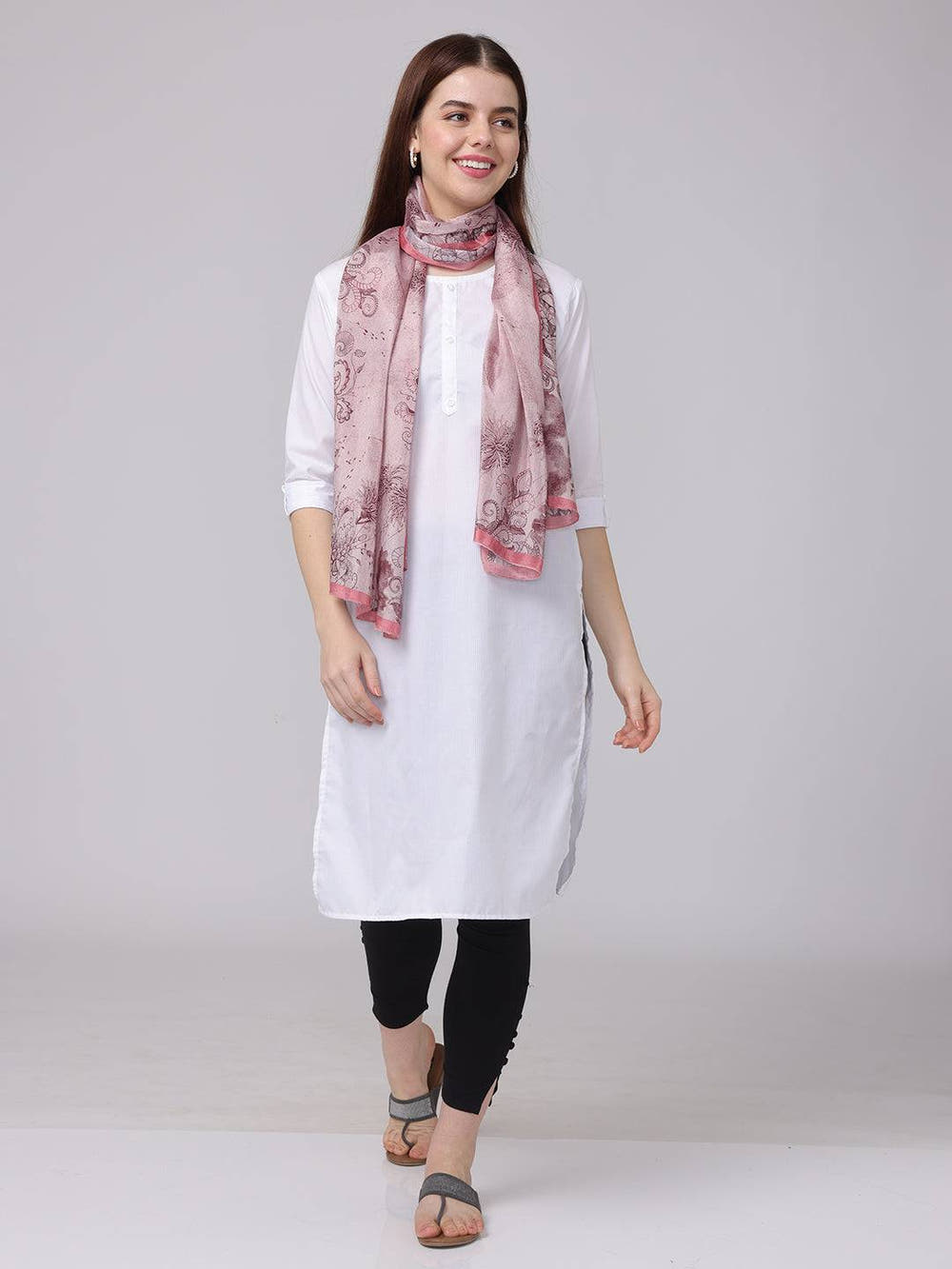 Crepe pink floral printed scarf paired with casual attire