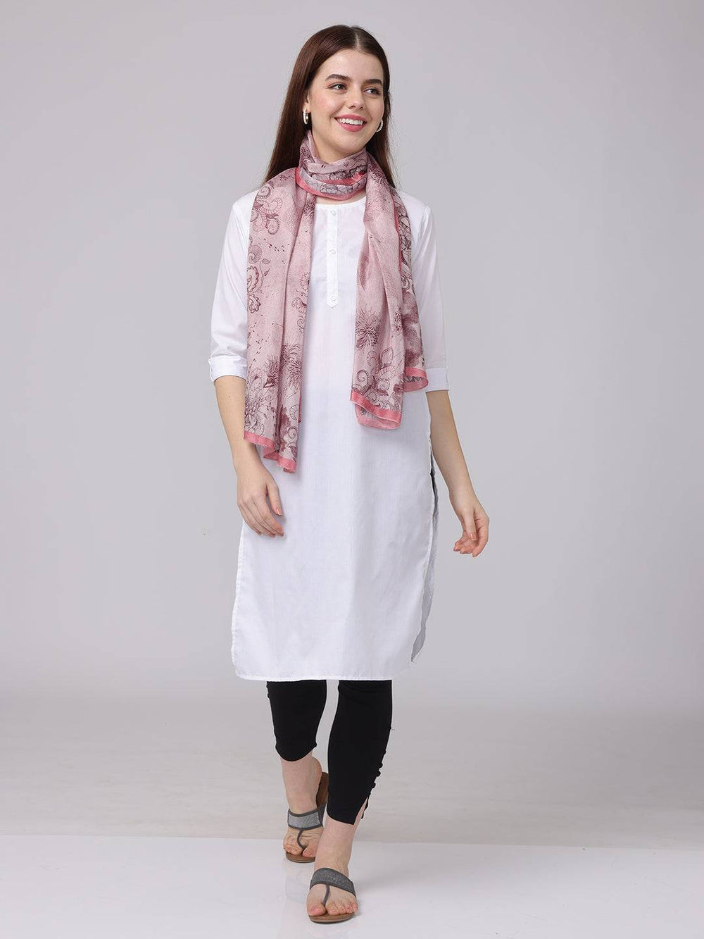 Crepe pink floral printed scarf paired with casual attire