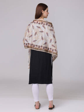 Feather pattern geometric borde scarf on model, back view