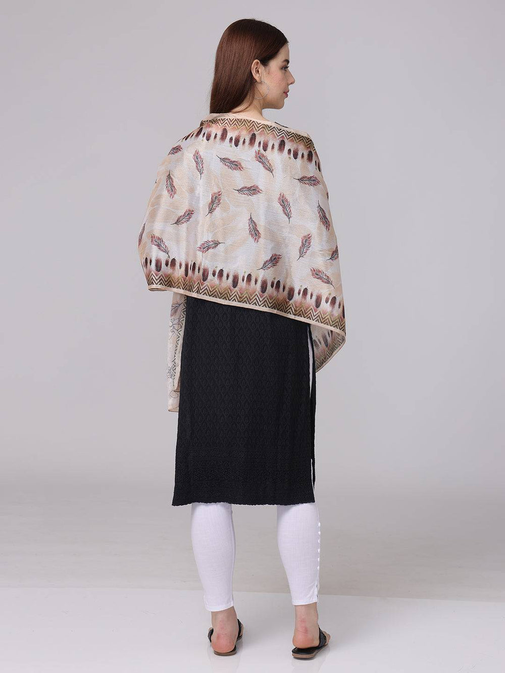 Feather pattern geometric borde scarf on model, back view