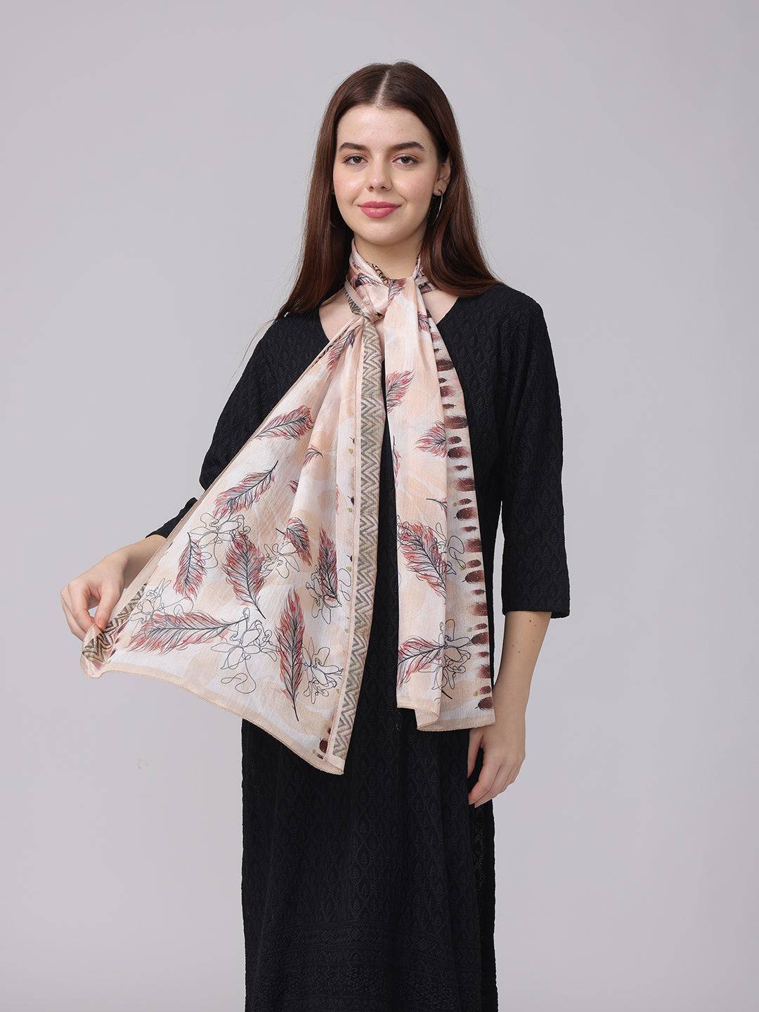 Feather pattern geometric borde scarf on model, front view