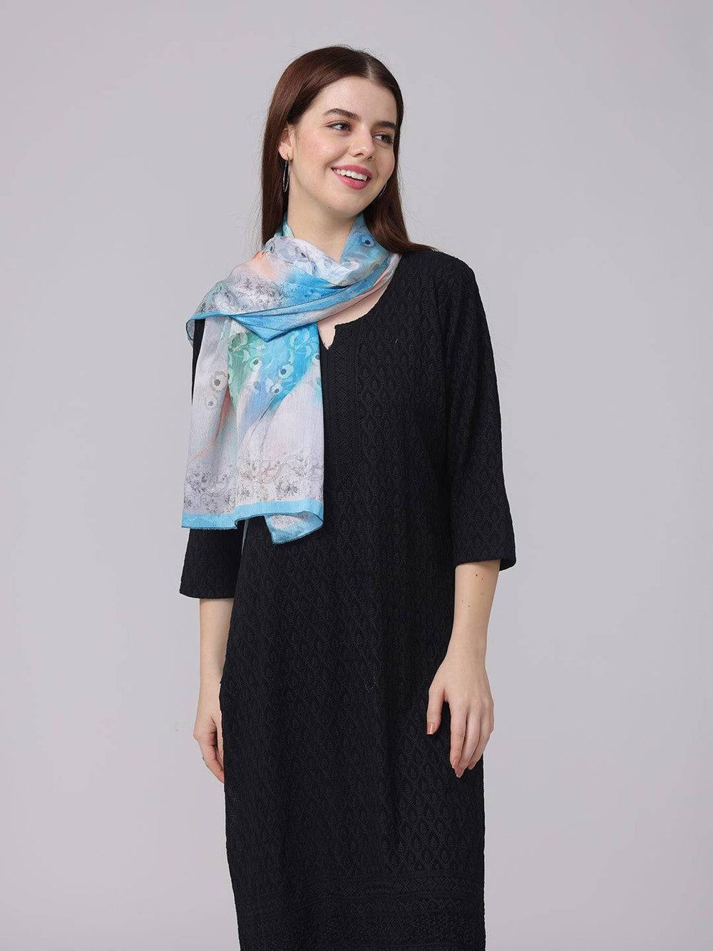 Vibrant Aqua Dream Scarf draped over shoulder