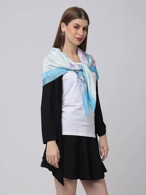 Dreamy Eiffel Blue Scarf draped over shoulders