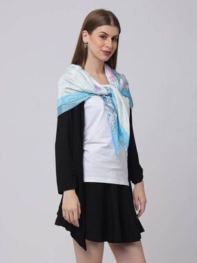 Dreamy Eiffel Blue Scarf draped over shoulders