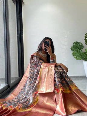 Sitting pose with Moonga Silk Kota Doriya Patola saree