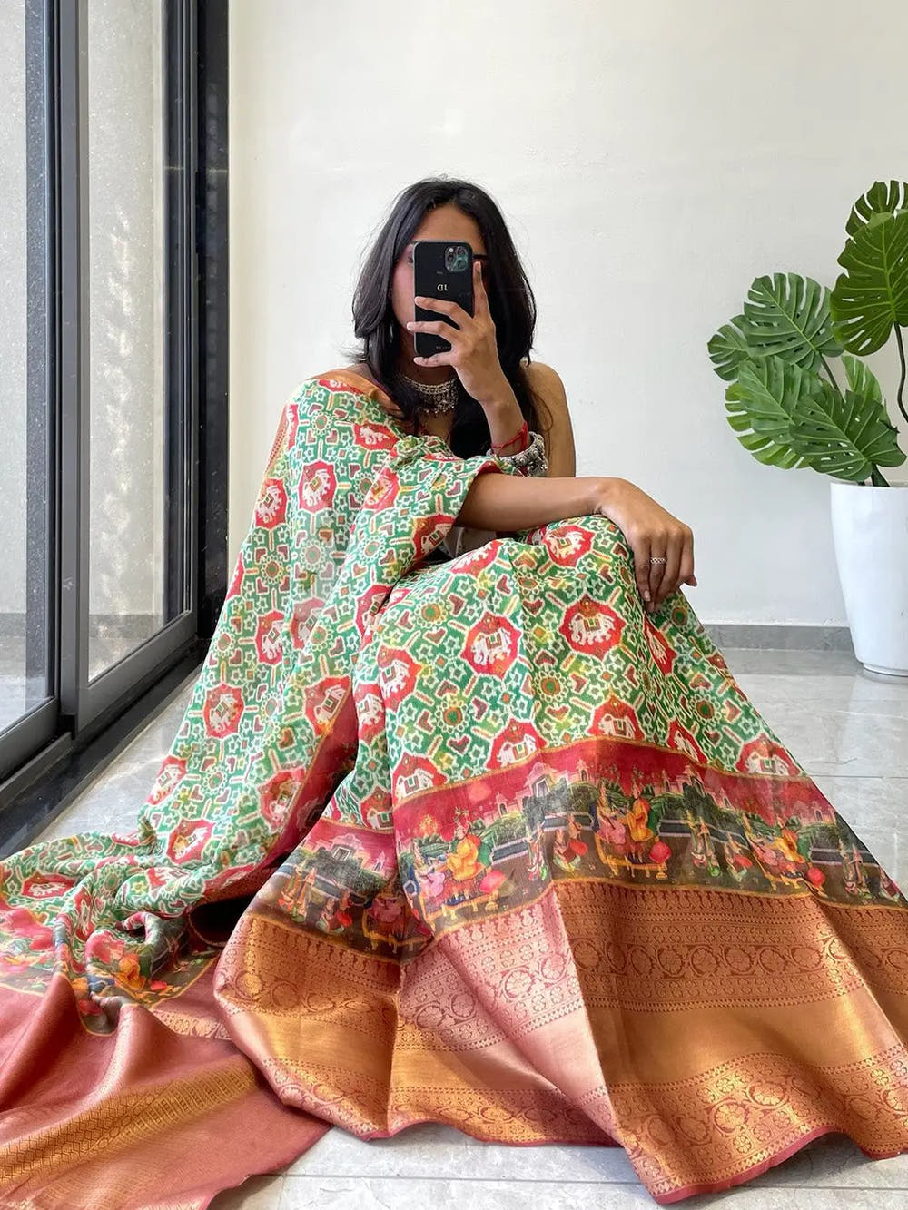 Trendy Moonga Silk Kota Doriya saree with colorful Patola print.