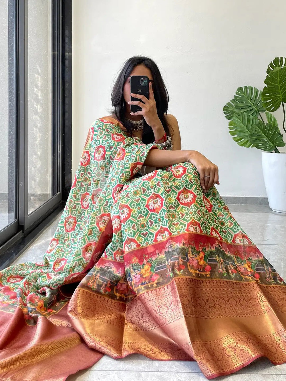 Trendy Moonga Silk Kota Doriya saree with colorful Patola print.