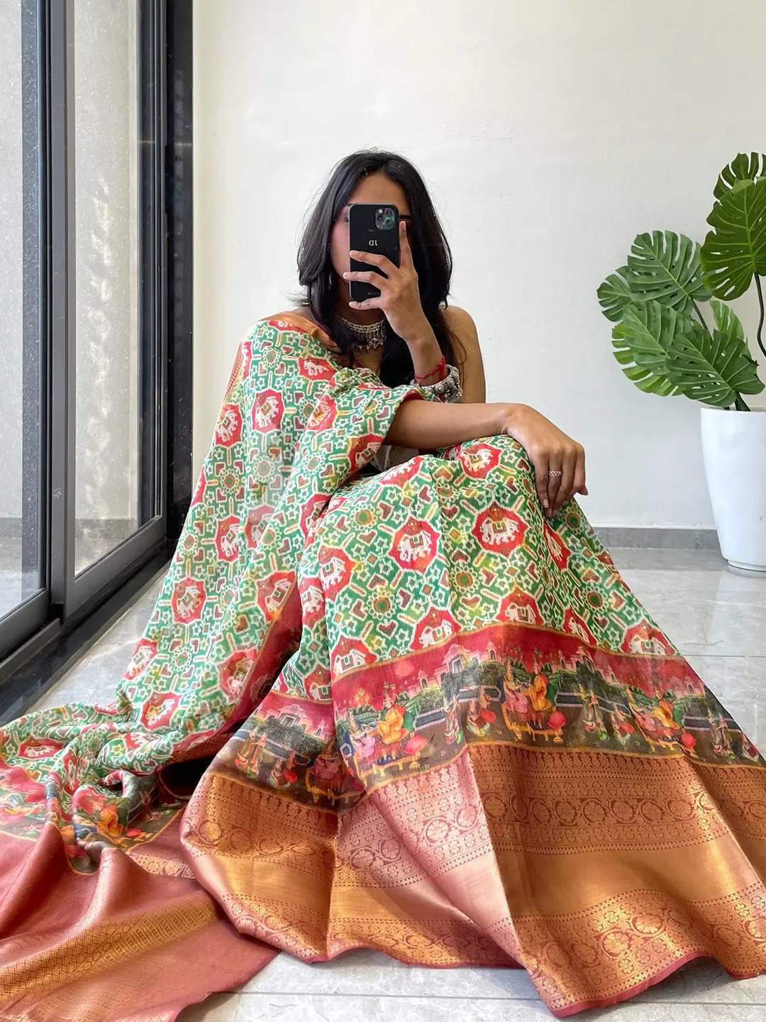Trendy Moonga Silk Kota Doriya saree with colorful Patola print.
