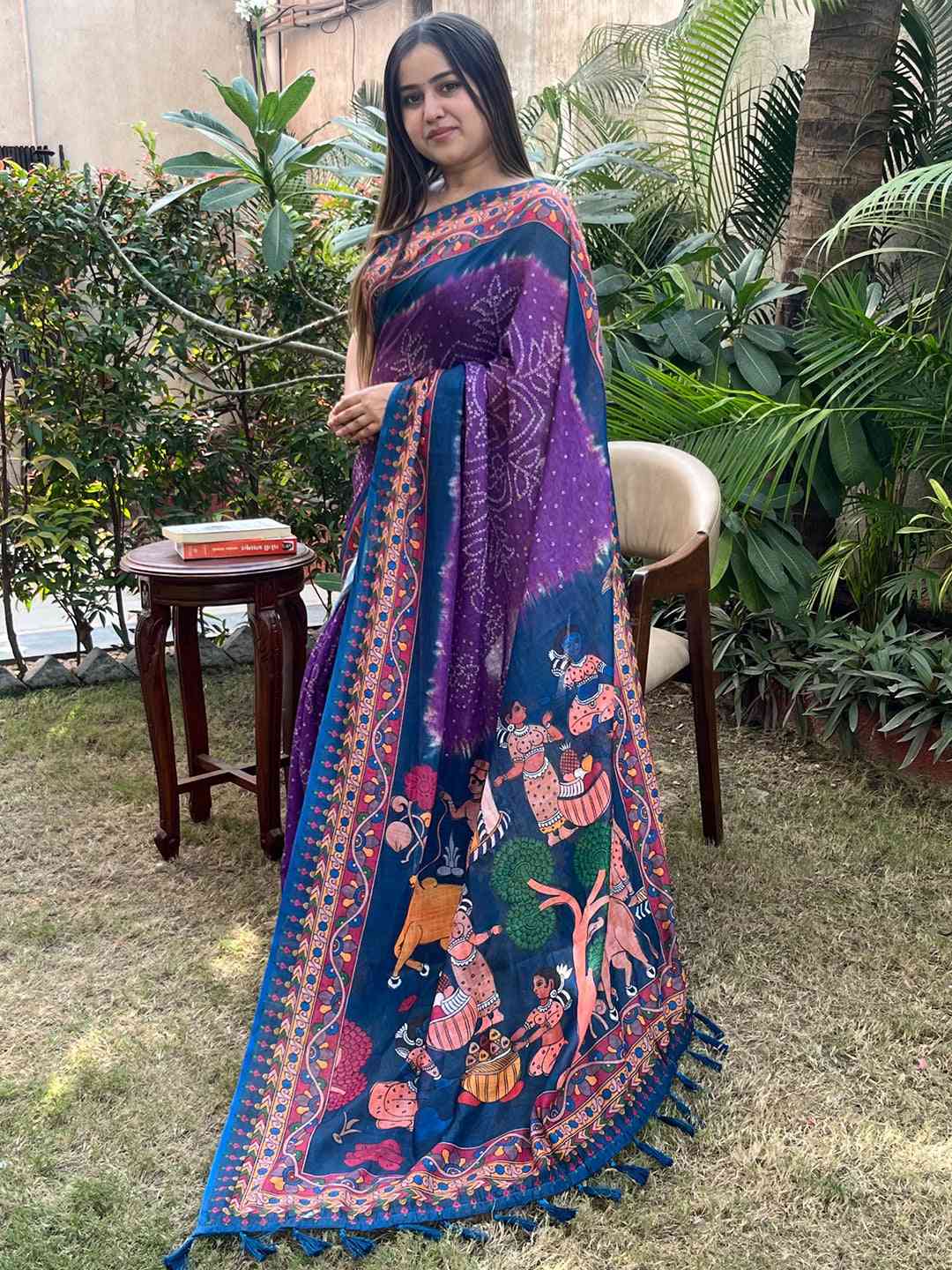 Purple saree with intricate Bandhej and Kalamkari print, garden