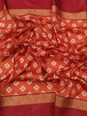 Rich red Gadwal border on soft silk saree with Pochampally print