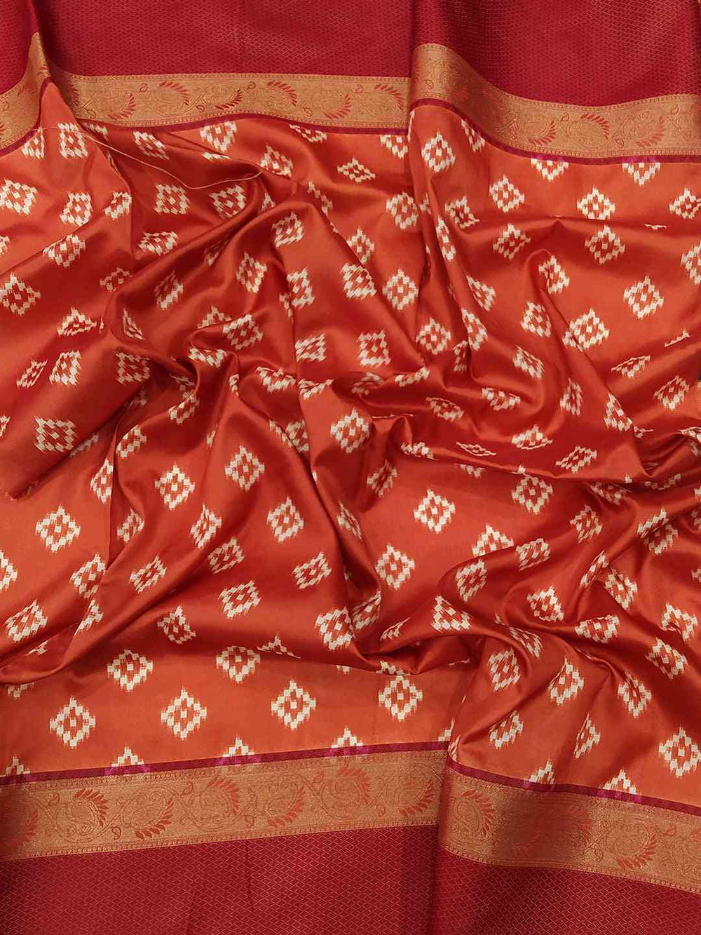 Rich red Gadwal border on soft silk saree with Pochampally print