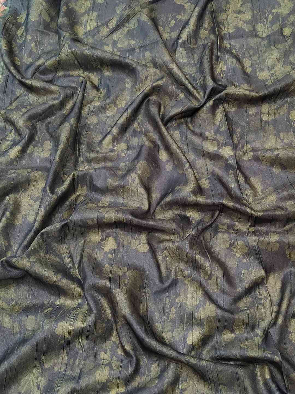 Textured fabric of pista silk saree with floral design