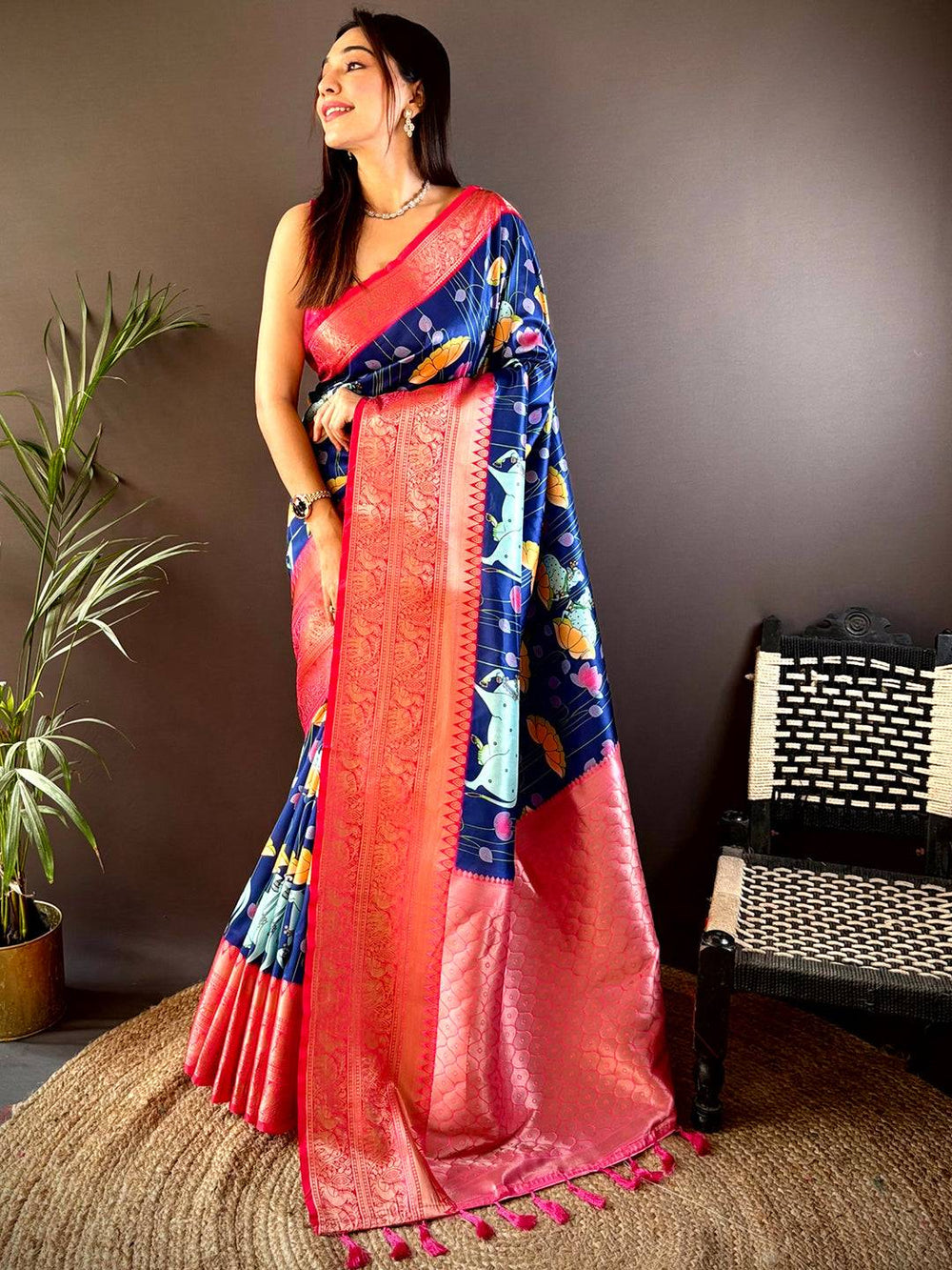 Elegant navy blue silk saree with Pichwai Kalamkari and pink zari border