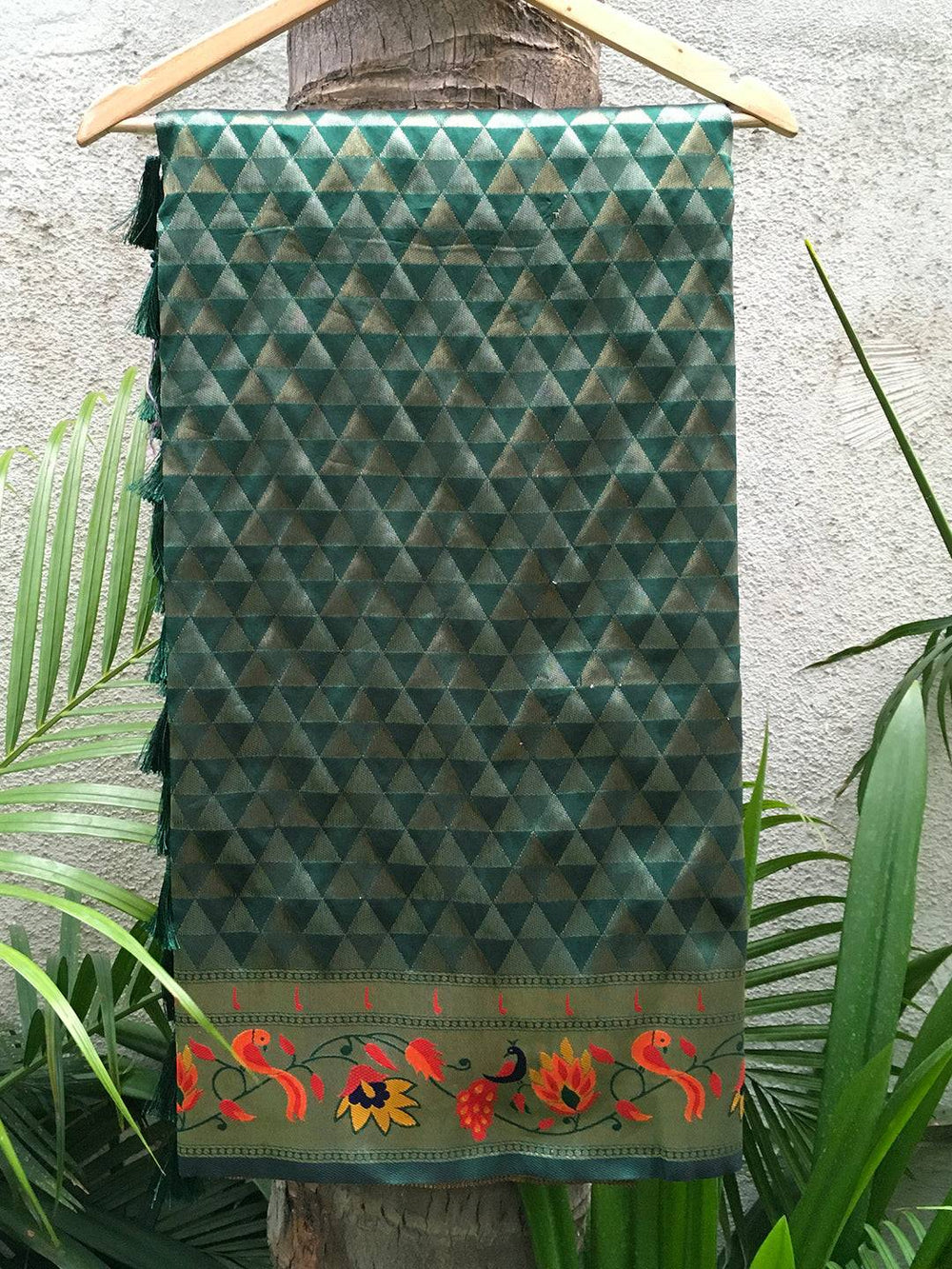 Green silk blend Paithani saree with woven zari work