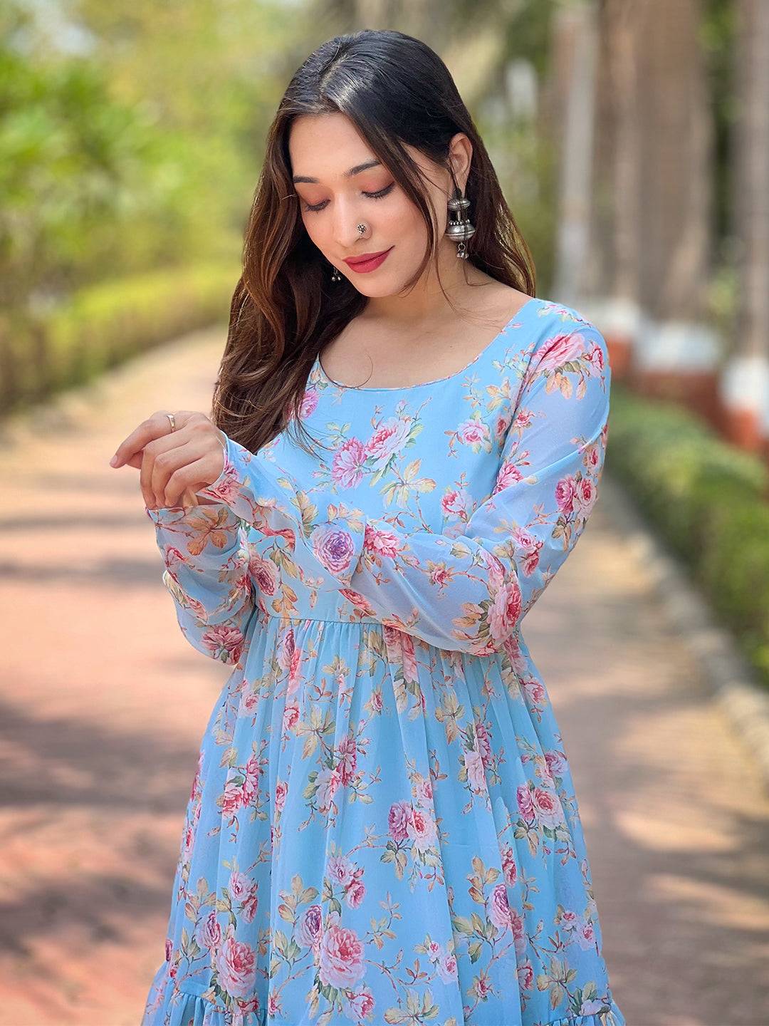 Model adjusting sleeve of Sky Beauty Floral Dress