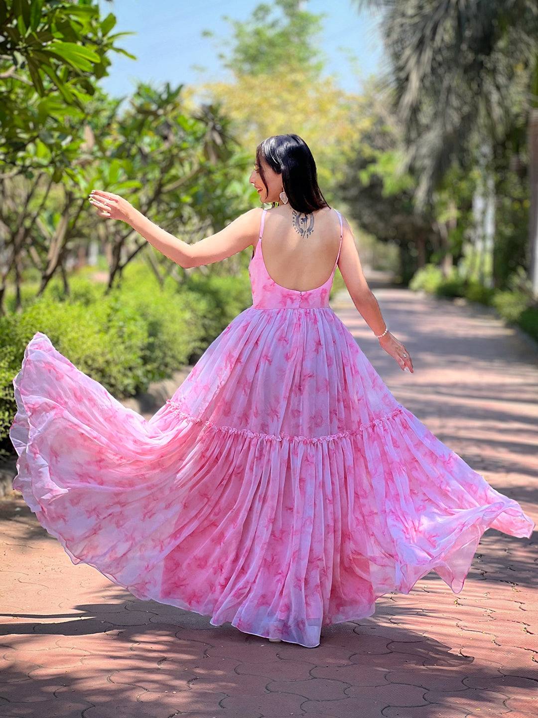 Back view of blush pink batik dress with open back design
