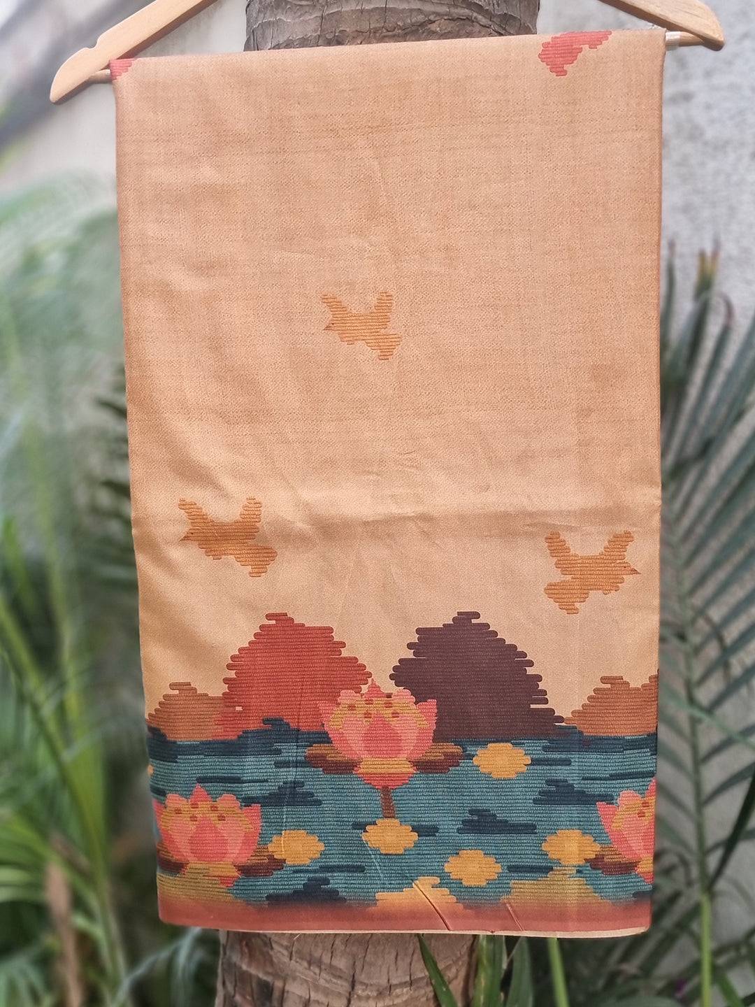 Tussar silk saree with gold color and freehand ikkat print.