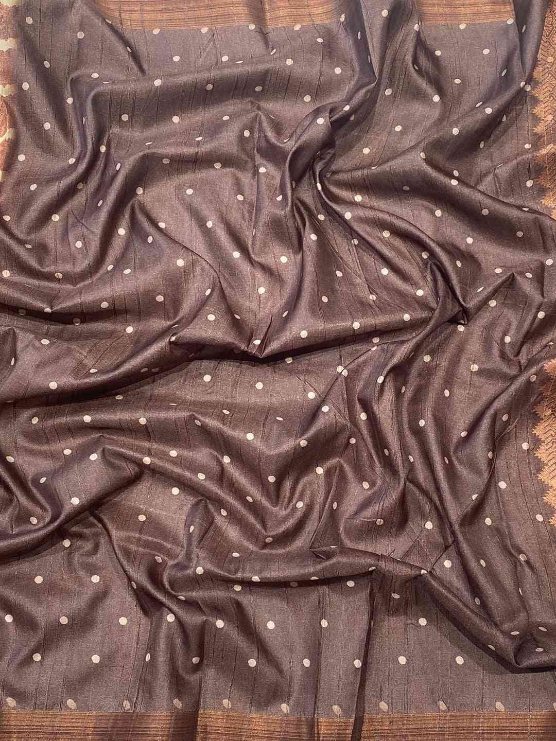 Close-up of Pure Tussar Ghicha Silk Saree fabric with polka dots