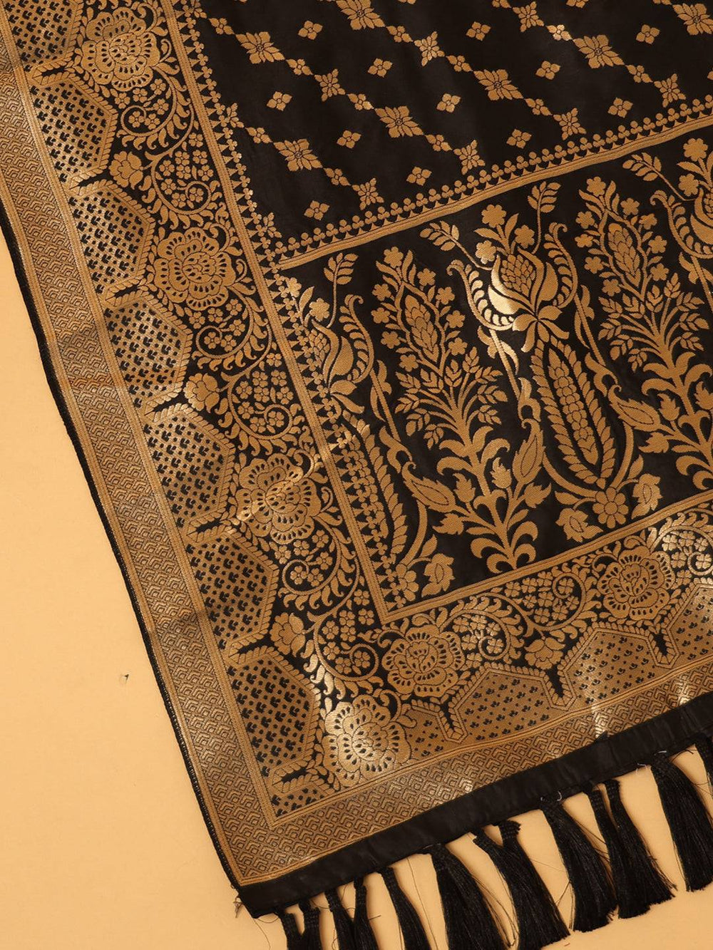 Close-up of woven design on black silk blend dupatta