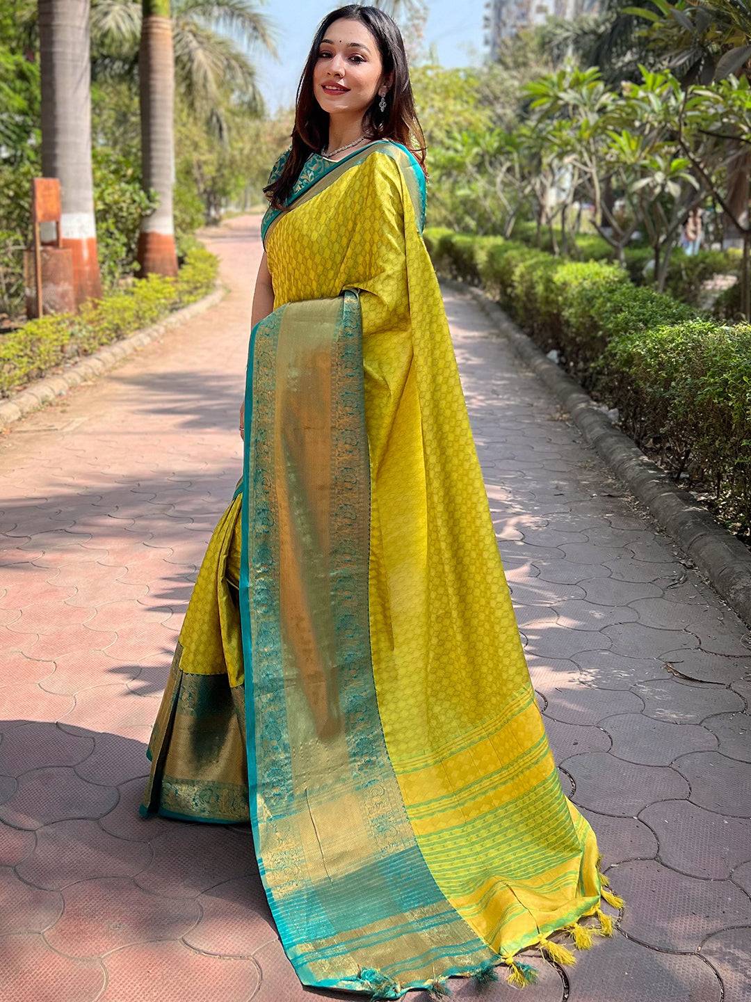 Traditional lime Kanjivaram saree with blue border