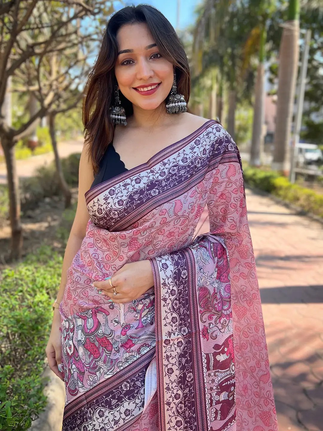 Model wearing pink Satin Kota Doria Saree with Kalamkari print