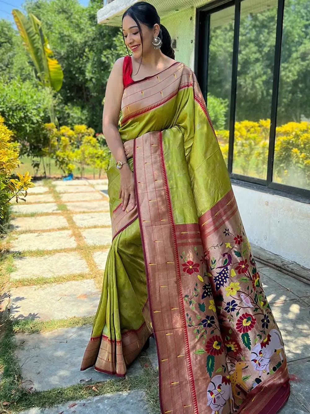 Full view of lime green Paithani silk saree with floral pallu.