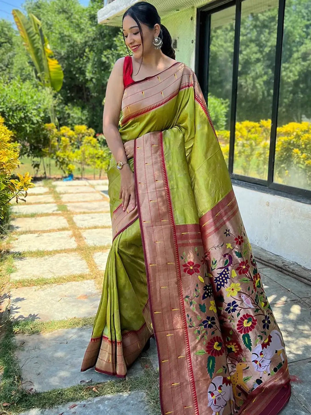 Full view of lime green Paithani silk saree with floral pallu.