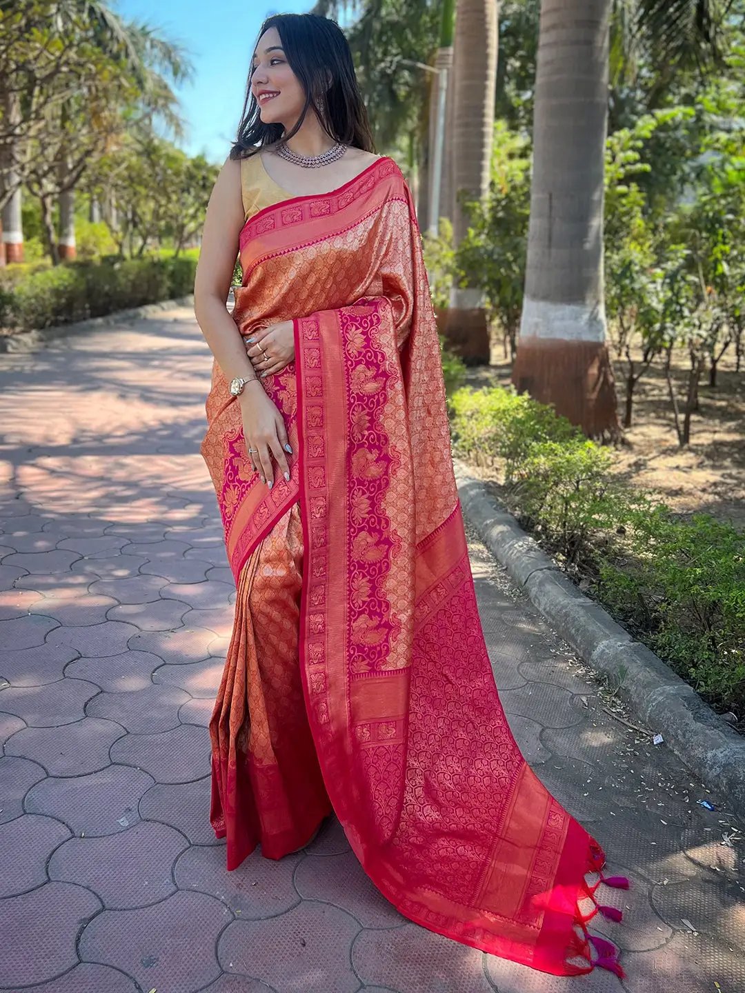 Elegant gold tissue Kanjivaram saree with intricate patterns