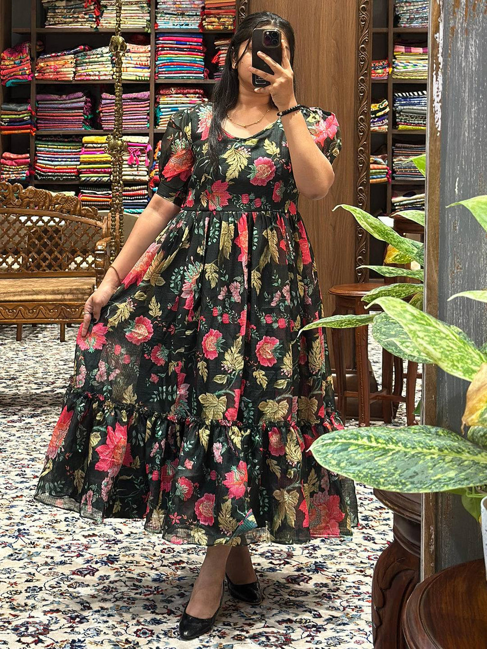 Model displaying Revan Black Floral Print Midi Dress