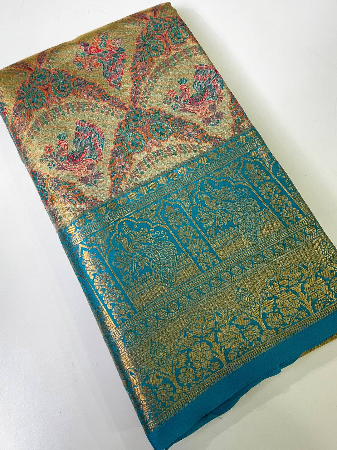 Majestic Rama And Gold Peacock Saree