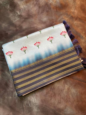Folded lotus print saree with dark blue and gold border