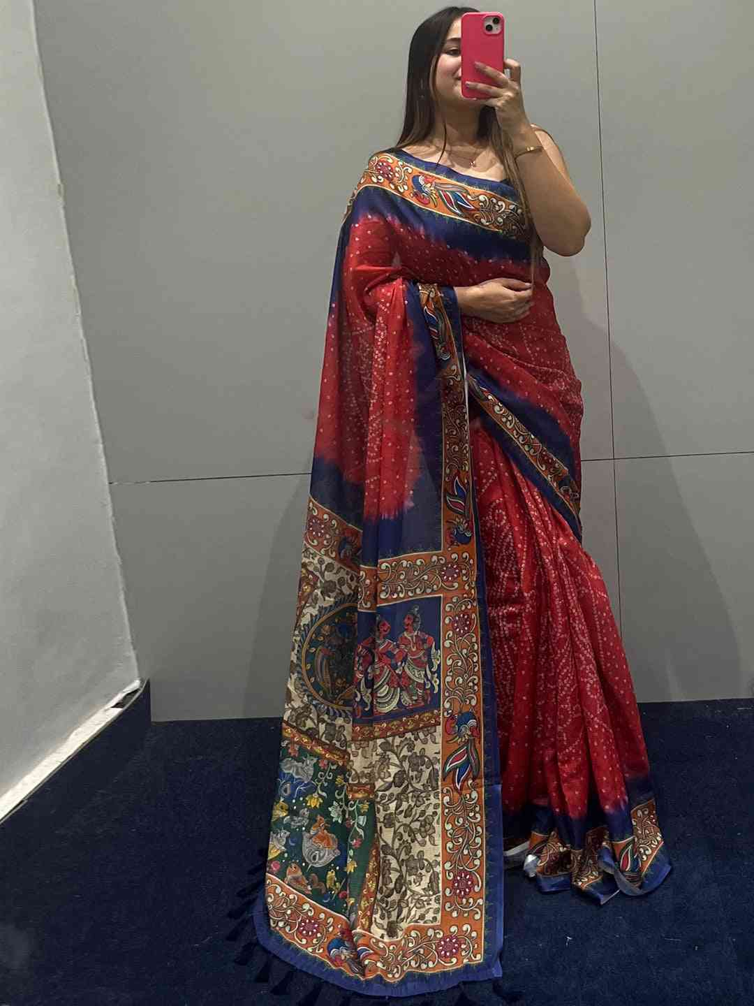 Red linen saree with Bandhej and kalamkari print, mirror selfie