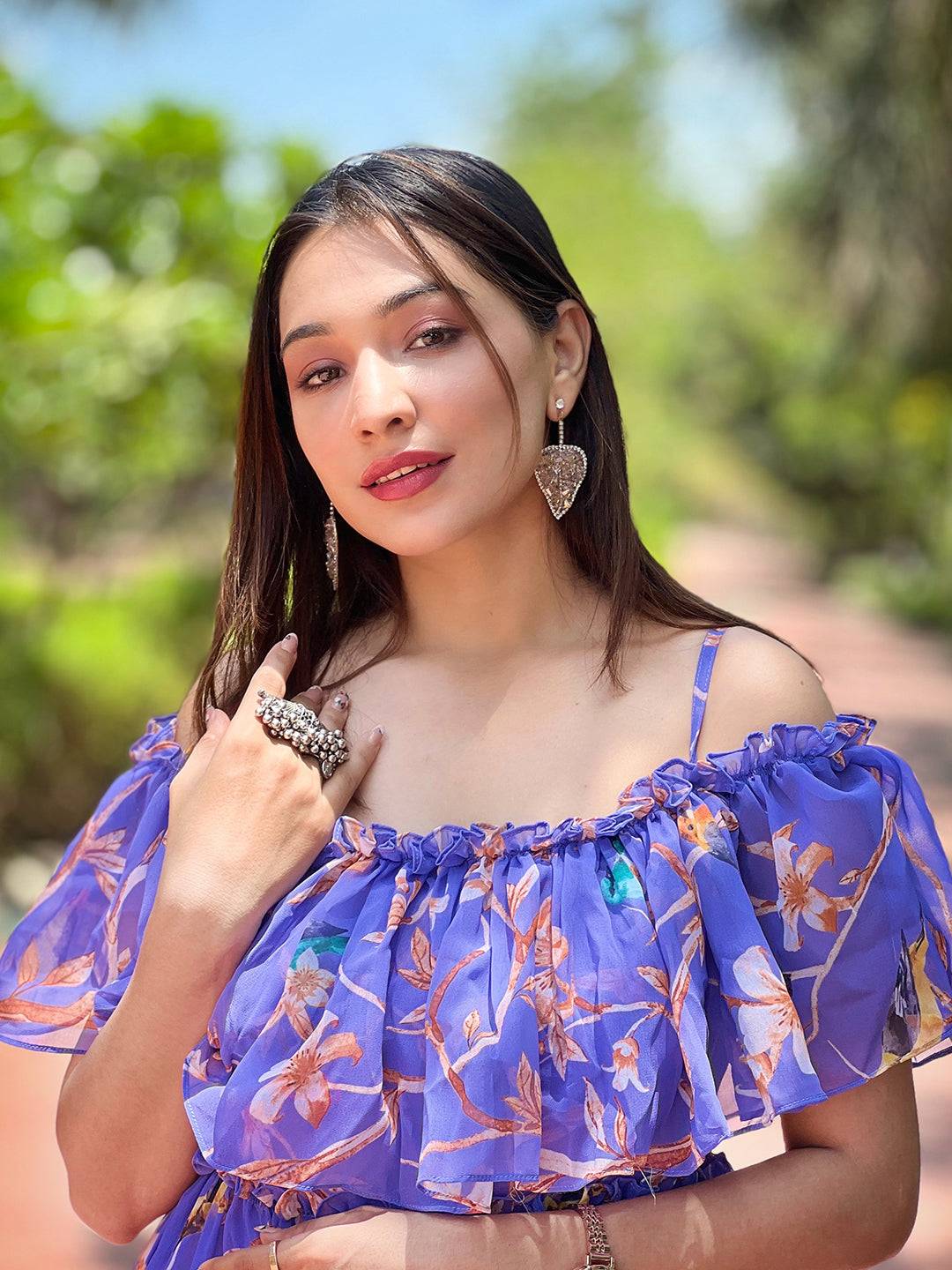Model wearing Purple Martini Floral Maxi Dress and jewelry