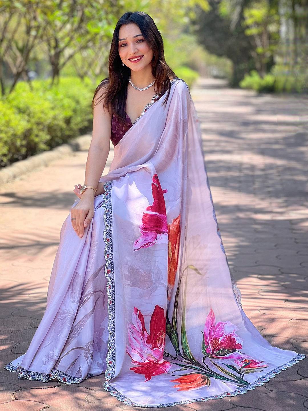 Grey satin georgette saree showcasing vibrant floral print