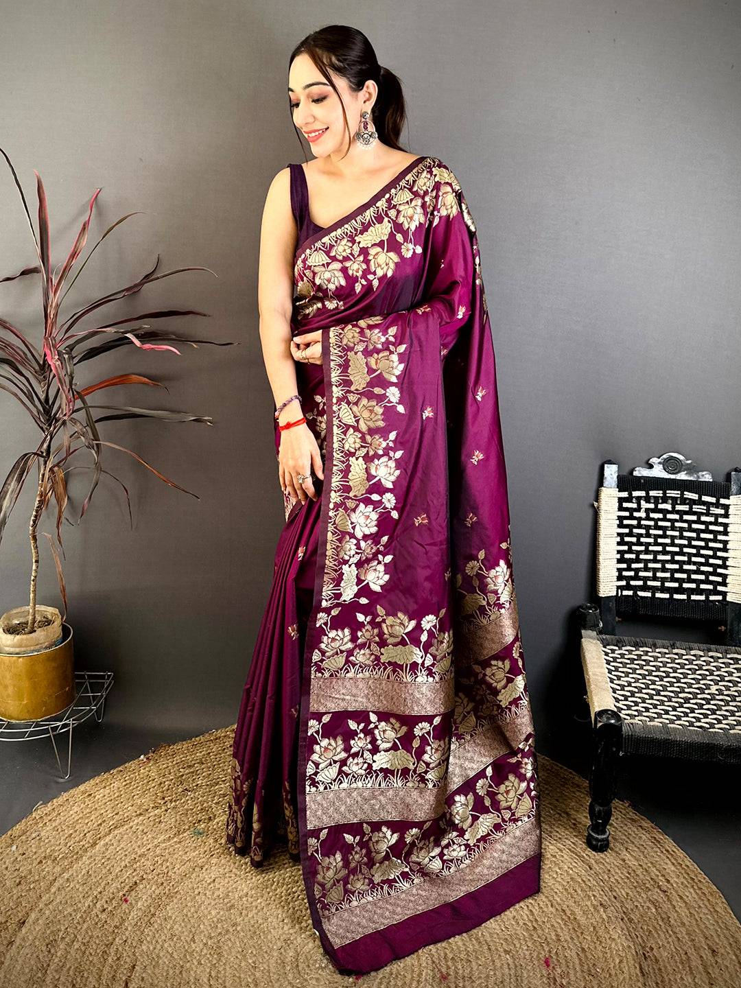 Model wearing Dark Purple Soft Silk Kanjivaram Saree with Gold Floral Design