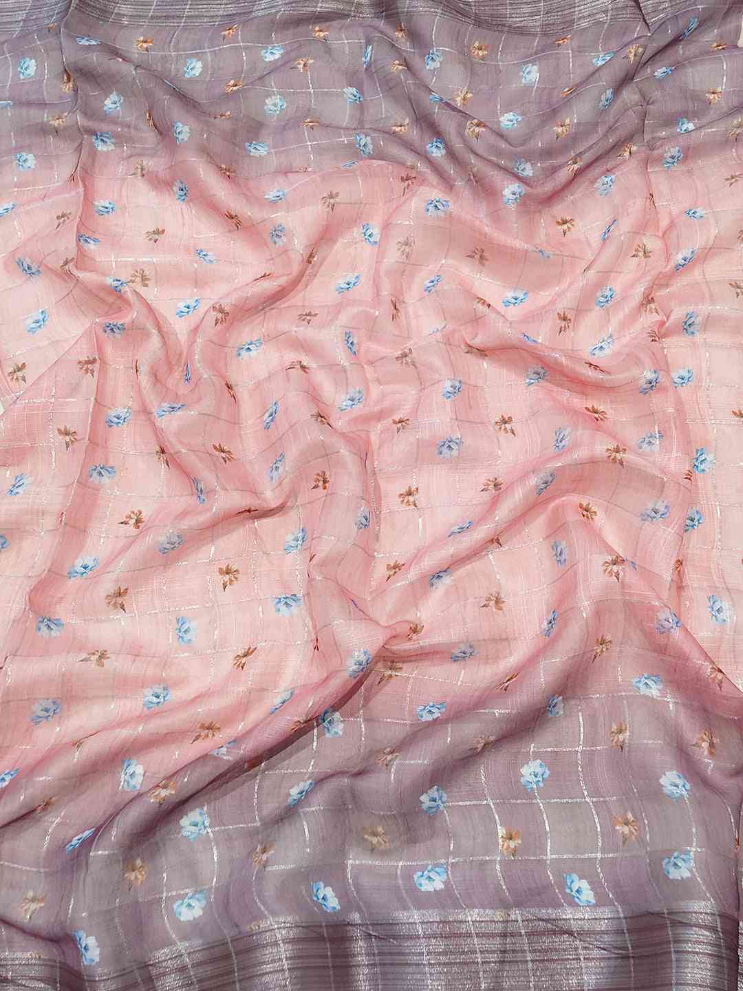 Close-up of floral print linen saree with zari chex
