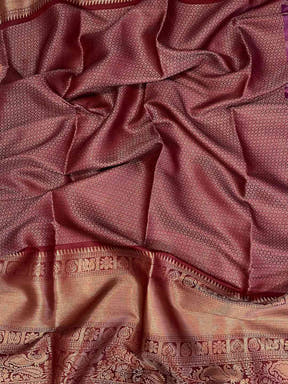 Close-up of soft silk Bandhej saree fabric with digital print