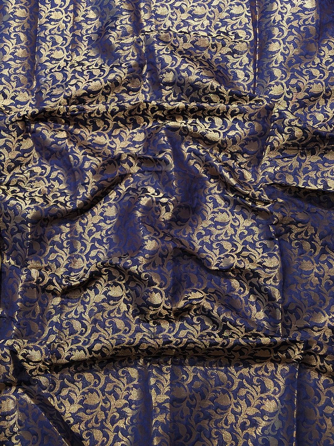 Close-up of Kanjivaram saree fabric with intricate weaving