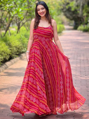 Rose Red Long Printed Dress flowing elegantly outdoors