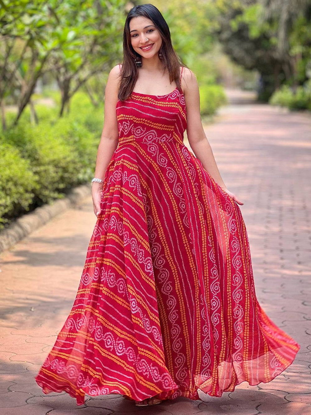 Rose Red Long Printed Dress flowing elegantly outdoors