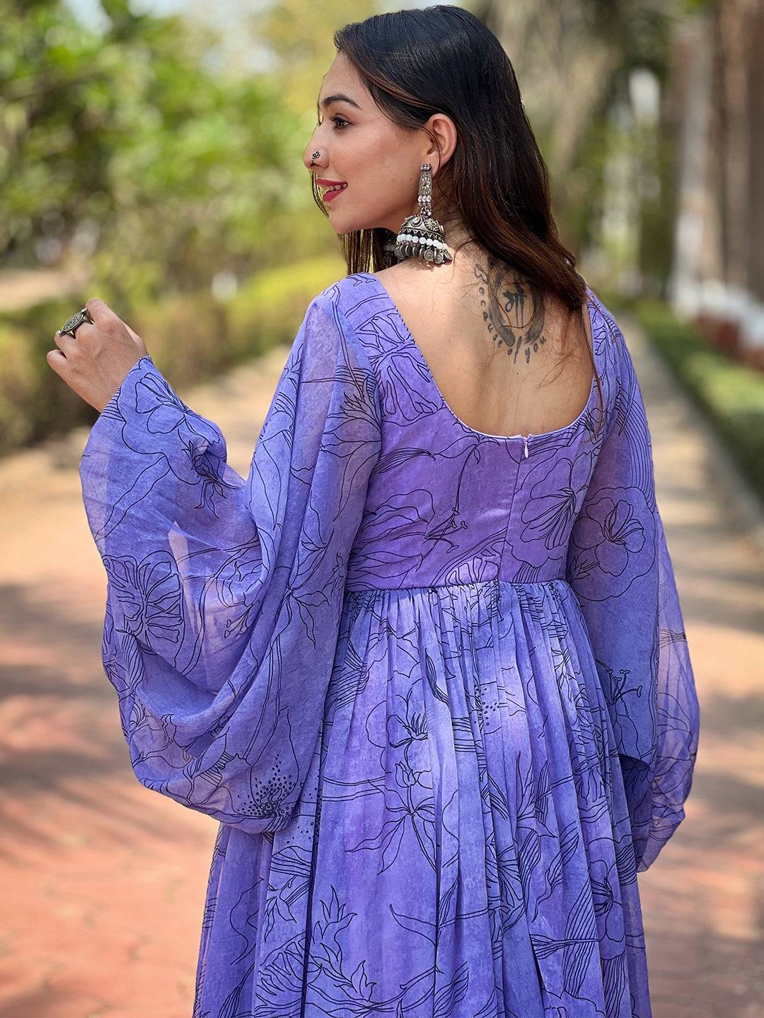 Back view of slate blue dress with floral design