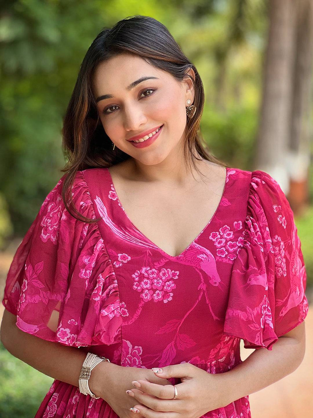 Close-up of Pink Peony V-neck Dress with floral pattern