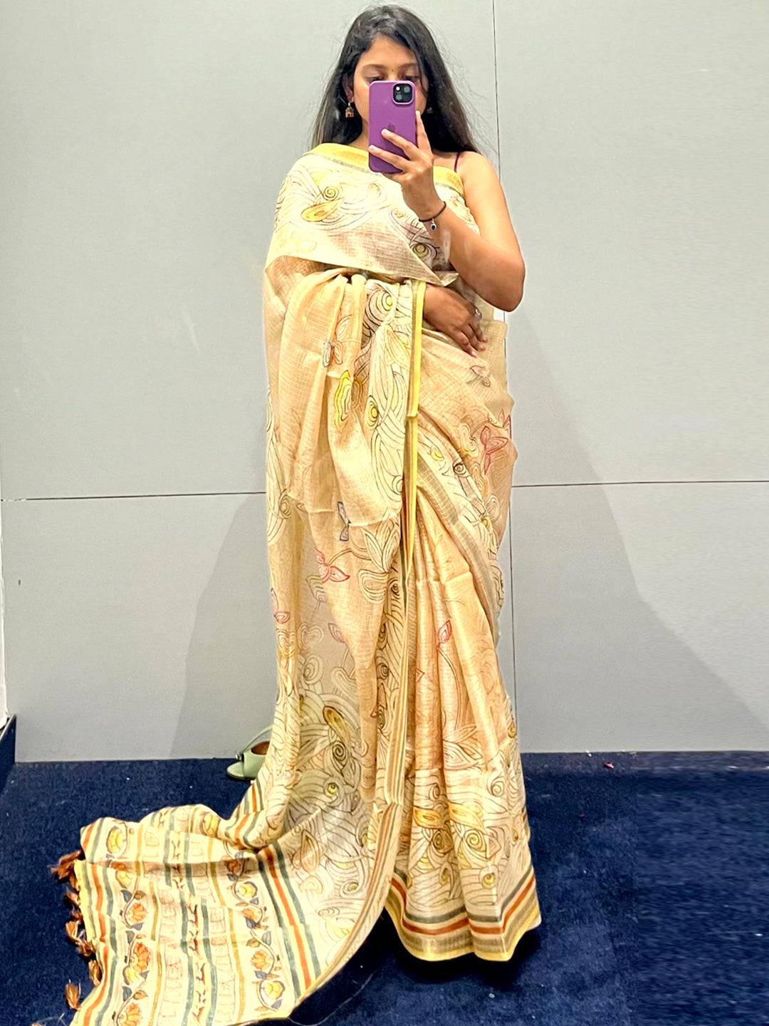 Floral Kalamkari print on yellow Kota Doriya silk saree, full view.