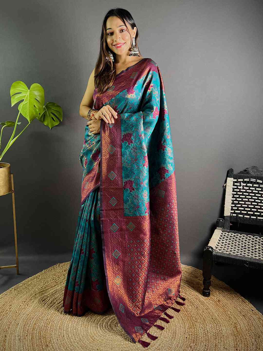 Front view of Teal Soft Silk Butta Weaving Saree with floral motifs