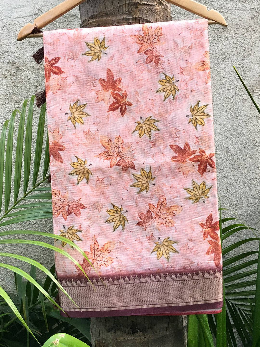 Kanjivaram peach saree with gold zari border and leaf print