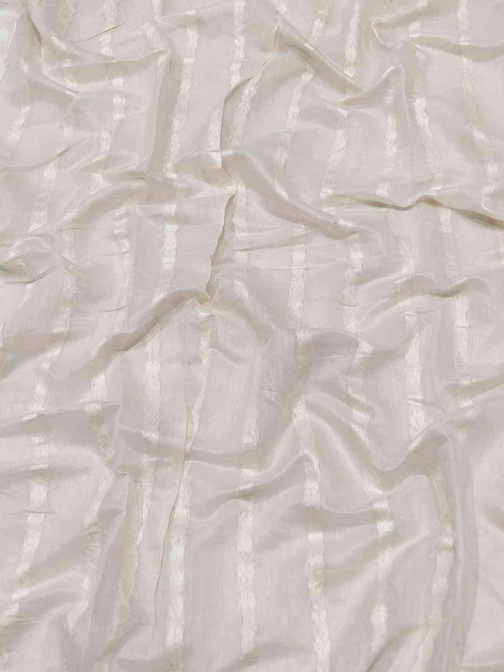 Close-up of white fabric with subtle stripe texture