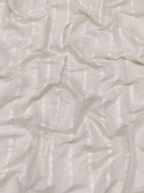Close-up of white fabric with subtle stripe texture