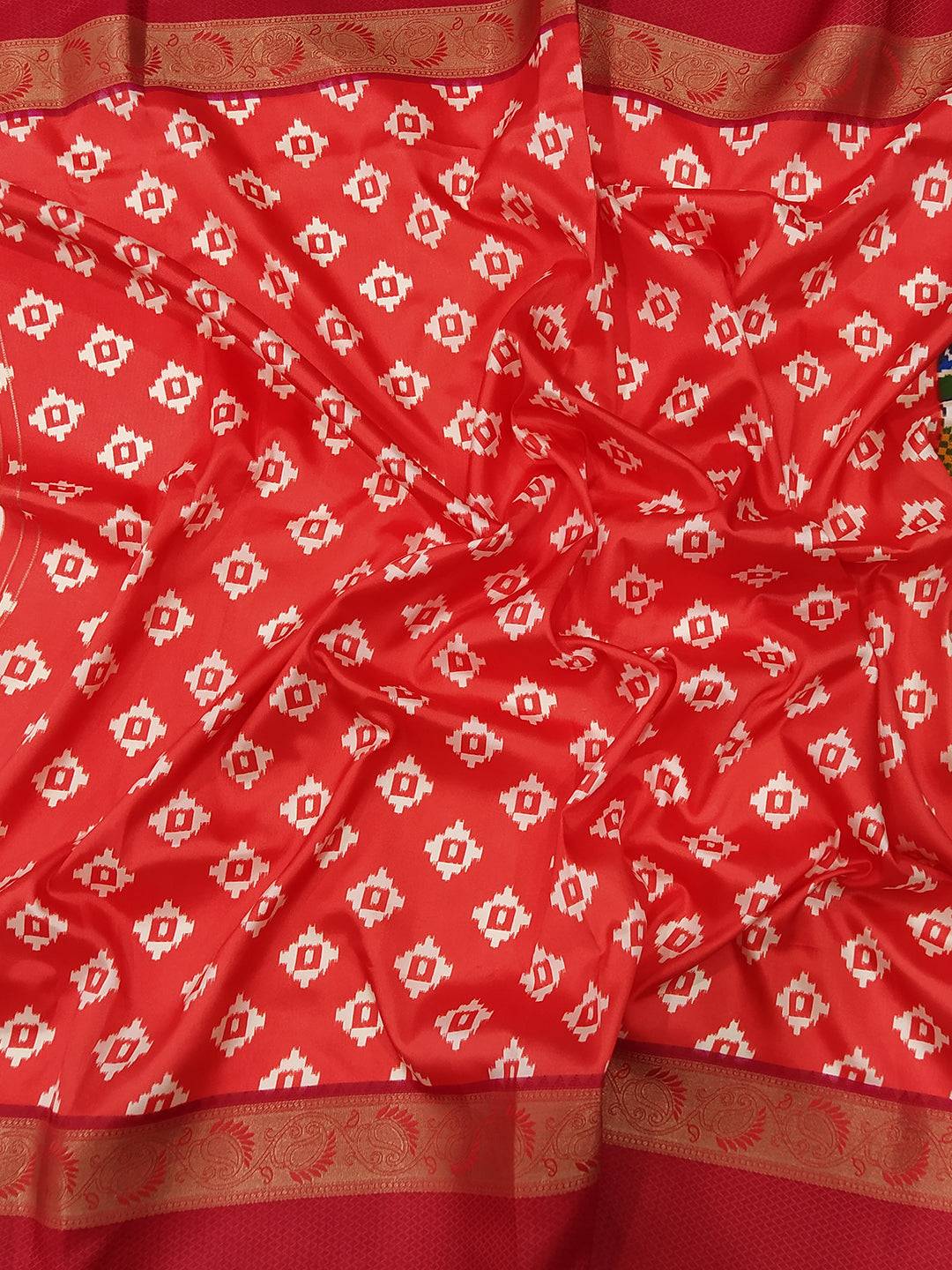 Intricate Pochampally print on soft silk saree with Gadwal border