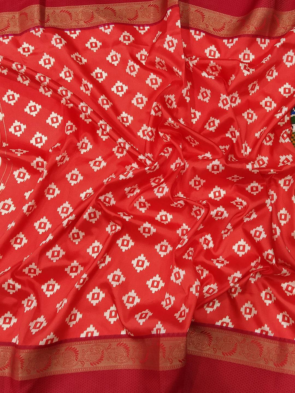 Intricate Pochampally print on soft silk saree with Gadwal border